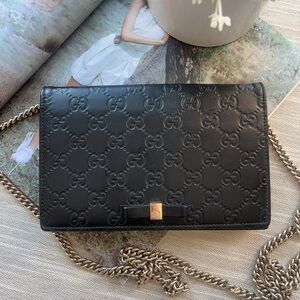 Gucci Black Embossed Leather Clutch with Gold Chain